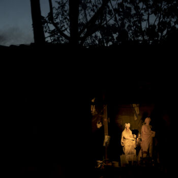 In this Friday, Nov. 20, 2017 photo, the terracotta statues of ancient Greek muses Erato, left, and Clio, stand in Haralambos Goumas' sculpture and ceramic workshop, in the Egaleo suburb of Athens. (AP Photo/Petros Giannakouris)