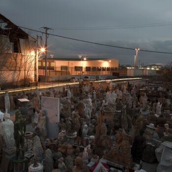 In this Tuesday Dec. 19, 2017 photo, terracotta statues, busts, antefixes and flower pots stands in the yard of Haralambos Goumas' sculpture and ceramic workshop, in the Egaleo suburb of Athens. (AP Photo/Petros Giannakouris)