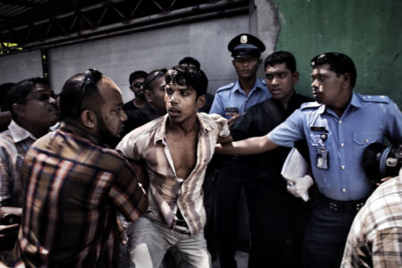 Francesco Zizola - A murder suspect is arrested after an attempt to escape from the police. Malé, Maldives. June 2007.