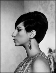 Philippe Halsman, Barbra STREISAND posing in her apartment for a Cosmopolitan magazine cover shoot.